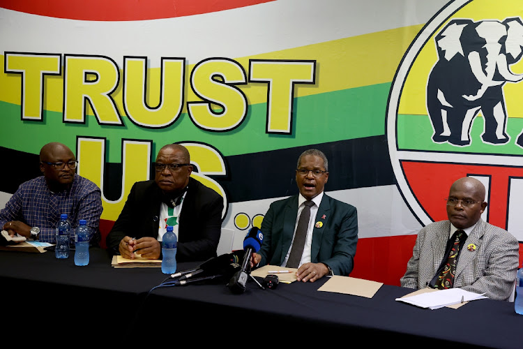 IFP President Velenkosini Hlabisa flanked by Nhlanhla Msimango, Blessed Gwala and Bonginkosi Kunene during a media briefing in Durban.