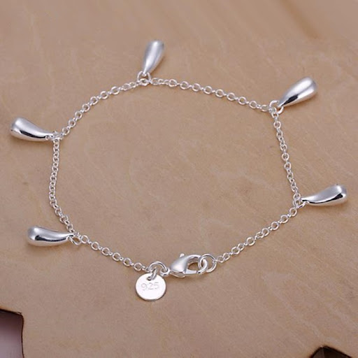 Title 2, 4-Piece Jewelry Set featuring a bracelet, neckl...