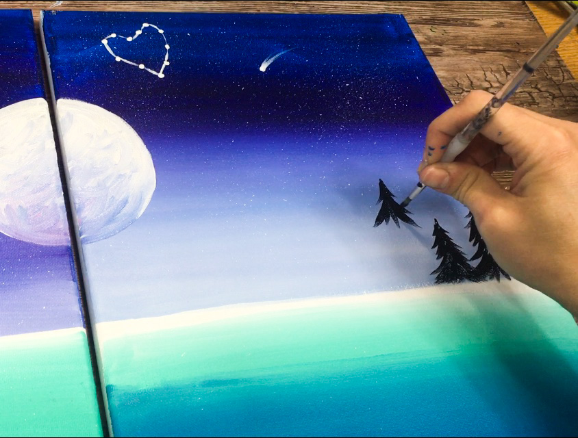 Hand painting a couples painting canvas for at home date night 