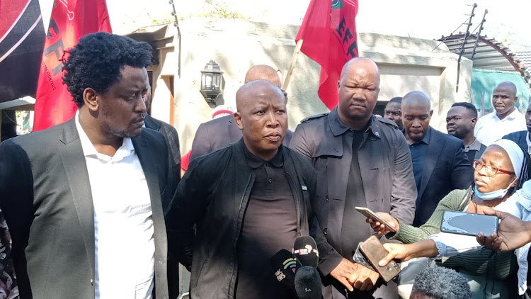 EFF president Julius Malema talking to the media outside the home of EFF's former secretary-general Godrich Gardee.