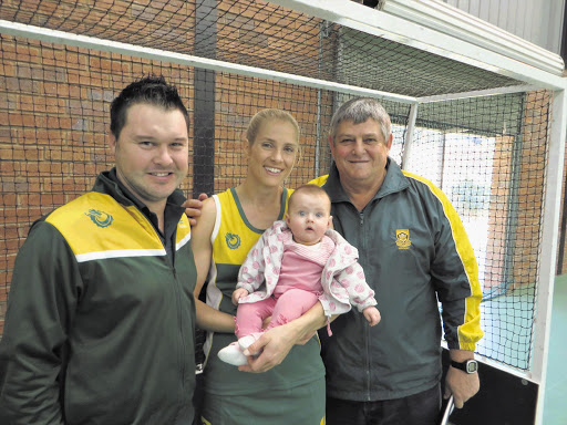 Cindy Hack, with baby Addison, is flanked by husband Ryan, left, and dad Lennie Botha Picture: Supplied