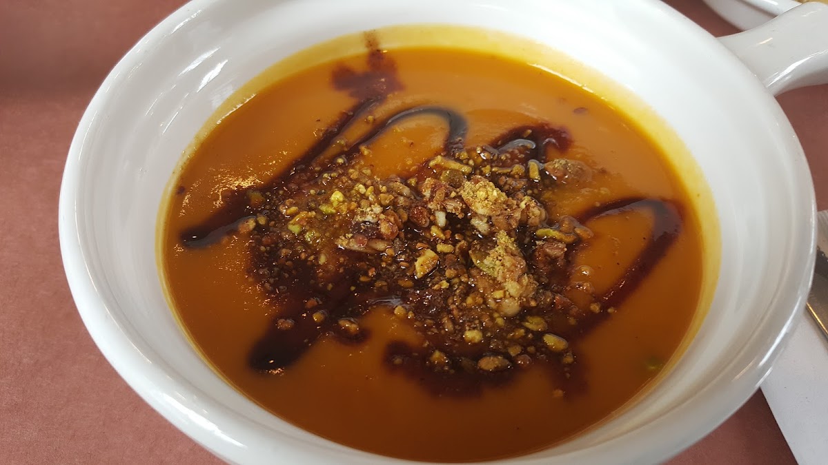 GF butternut squash soup with pistachios and balsamic reduction drizzle