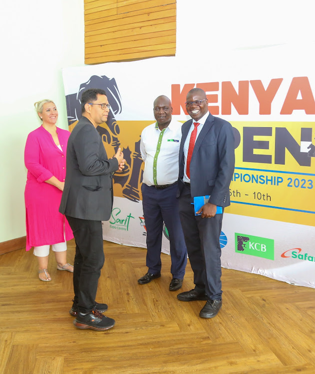 KCB chess club team manager, Isaac Babu (second right), interacts with Kenya Chess Federation president, Bernard Wanjala, Indian Chess Grand Master, Sriram Jha and Fide Gens Una Sumus