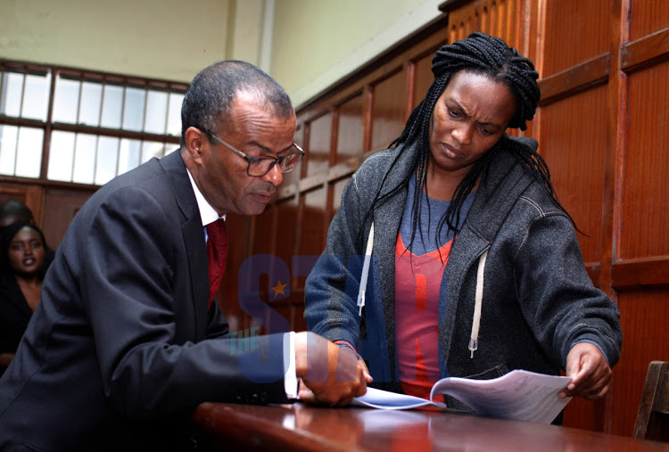 Lawyer Philip Murgor with his client Sarah Wairimu in court on September 25, 2019.