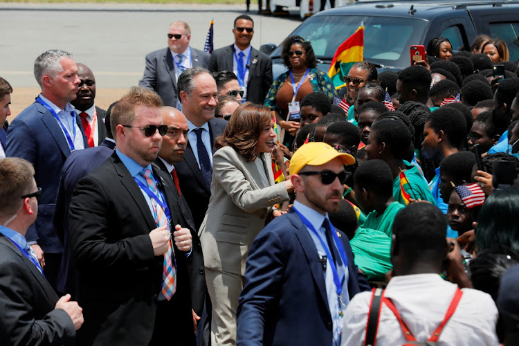 US Vice-President Kamala Harris greets children as she arrives at the Kotoka International Airport to begin her trip to Ghana, Tanzania and Zambia, in Accra, Ghana, March 26 2023. Picture: FRANCIS KOKOROKO/REUTERS