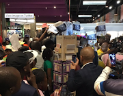 Protesters disrupted the book launch of 'Gangster State' in Johannesburg on Tuesday night.