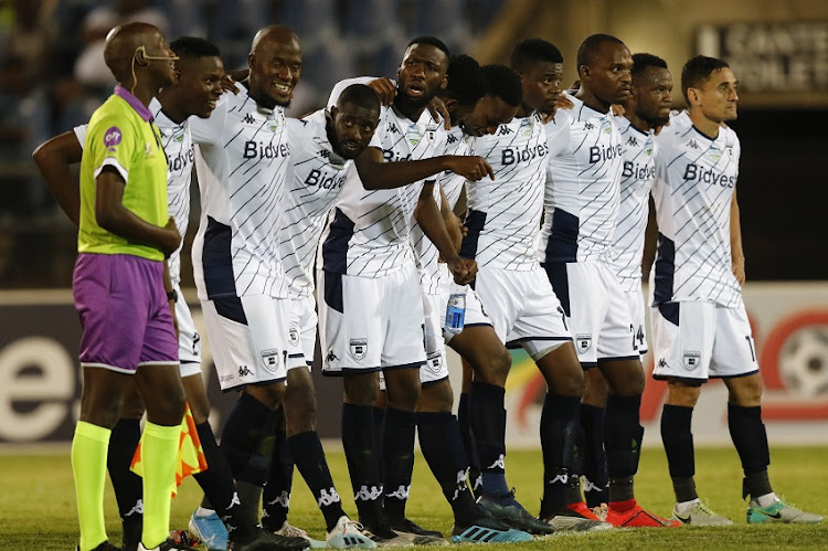 Players of Bidvest Wits with the official during the Telkom Knockout 2019, Last 16 match between Maritzburg United and Bidvest Wits at Harry Gwala Stadium on October 18, 2019 in Pietermaritzburg, South Africa.