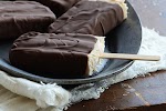 Chocolate-Covered Toasted Coconut Pops {Paleo} was pinched from <a href="http://www.anediblemosaic.com/?p=14237" target="_blank">www.anediblemosaic.com.</a>