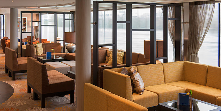 Meet new friends at the Panorama Lounge social hour when you sail Avalon Tapestry II.