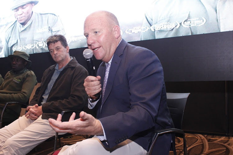 Ol-Pejeta Conservancy CEO Richard Vigne explains a point as Vet Surgeon and Embryo Transfer Specialist Dr Morne de la Ray looks on.