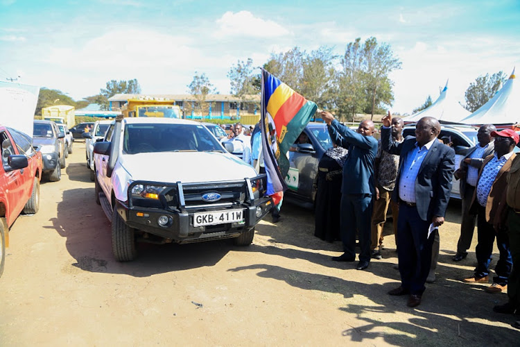 Machakos Governor Deputy Governor Francis Mwangangi flags off vehicles ferrying free seeds to farmers in 40 wards during the programme's launch at Tala Township primary grounds in Matungulu subcounty on Friday, October 21, 2022.