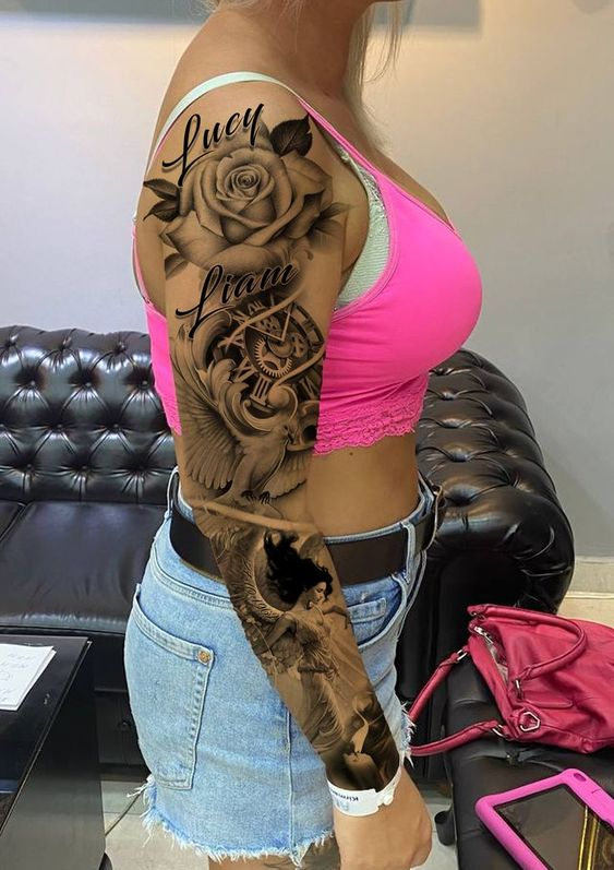 lady with full sleeve tattoo on her arm