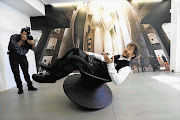 TOPS: Thomas Heatherwick - demonstrating his Spun chair - was selected as the lead architect to transform the historic grain silos at the V&A Waterfront in Cape Town into an art museum