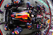 Max Verstappen makes a pitstop during the F1 Grand Prix of Qatar at Losail International Circuit on November 21, 2021 in Doha, Qatar.