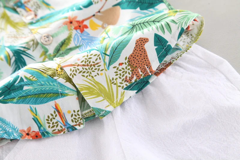 Ensemble chemise à manches courtes et short d'été pour garçon, parfait pour les journées chaudes, confortable et respirant pour l'été.