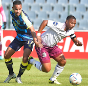 Moroka Swallows player Andile Jali (right) wins possession during the DStv Premiership match against Cape Town City FC at Dobsonville Stadium on August 09, 2023.