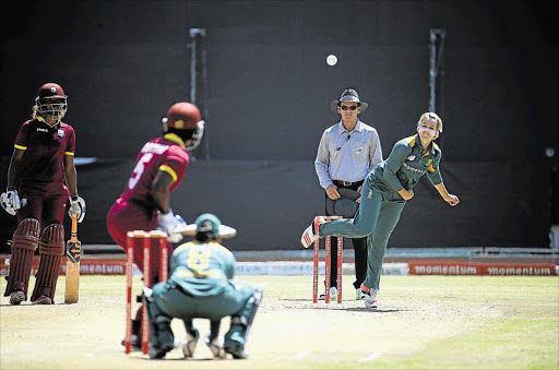 ON THE OFFENSIVE: South Africa's Dane van Niekerk bowls delivery during the first ODI against the West Indies at Buffalo Park yesterday Picture: MARK ANDREWS