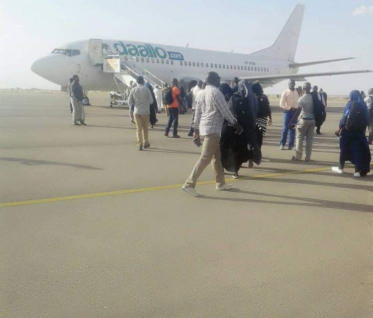 Kenyan citizens take a flight at Garowe Airport in Puntland, Somalia on Thursday, May 28.