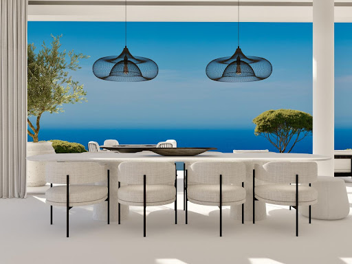 Dining room with sea view and modern chandelier in this luxury villa for sale in Benahavís ($7,795,292 - 733 m²)