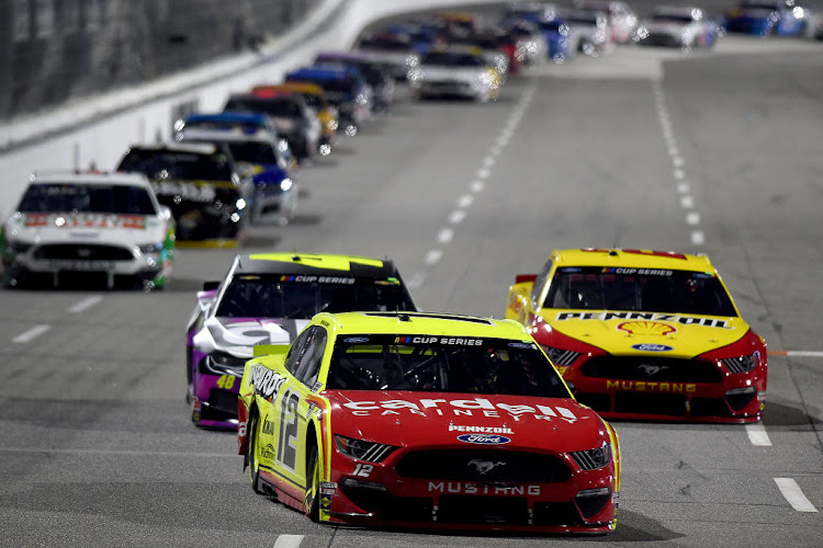 Ryan Blaney, driver of the #12 Menards/Cardell Caninetry Ford, races during the NASCAR Cup Series Blue-Emu Maximum Pain Relief 500 at Martinsville Speedway on June 10, 2020 in Martinsville, Virginia.