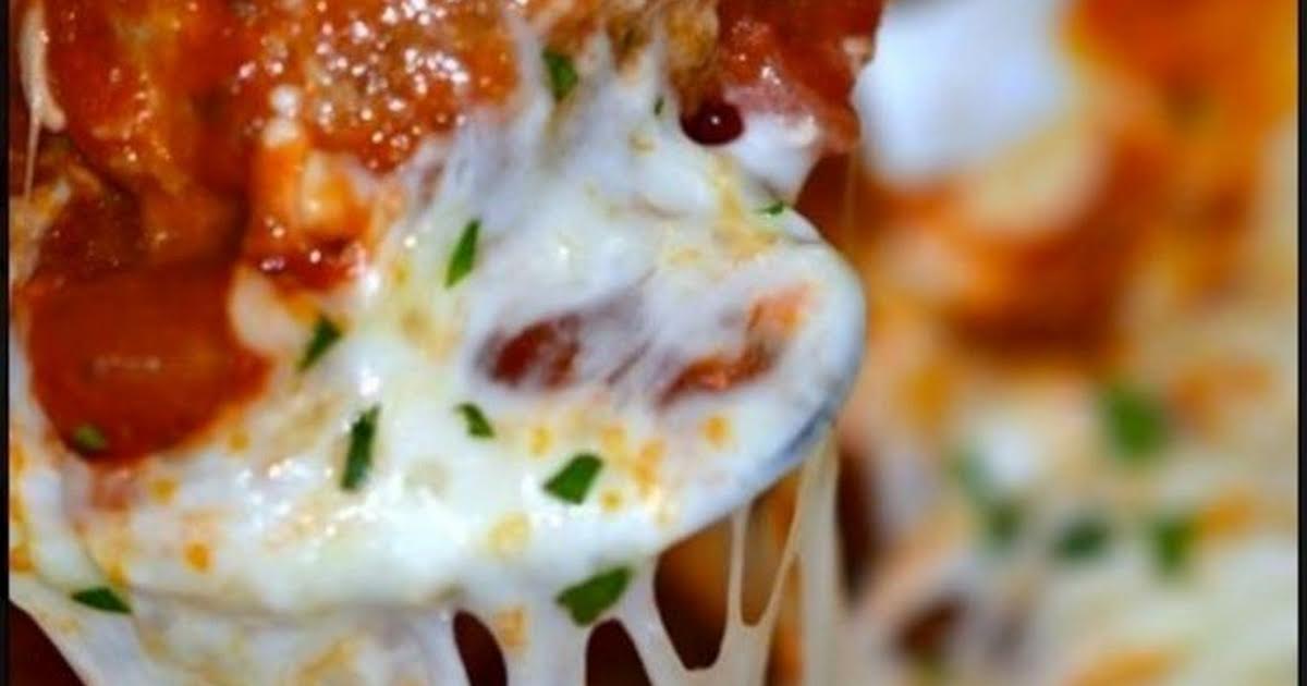 Meatballs smothered in Mozzarella | Just A Pinch Recipes