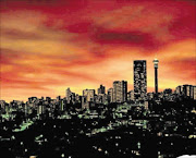 PLACE OF GOLD: Joburg skyline at night.  
      photo: spurwing