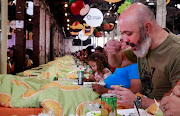 Benji Engelbrecht (39) enjoys his breakfast during South Africa's Guinness World Records attempt for the title for the most people eating breakfast in bed.