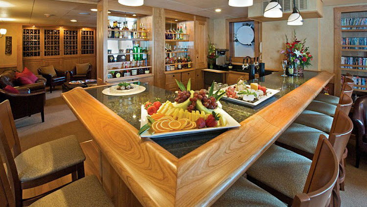 Passengers can find hors d'oeuvre, fine wines and cocktails in the bar aboard Safari Explorer.

