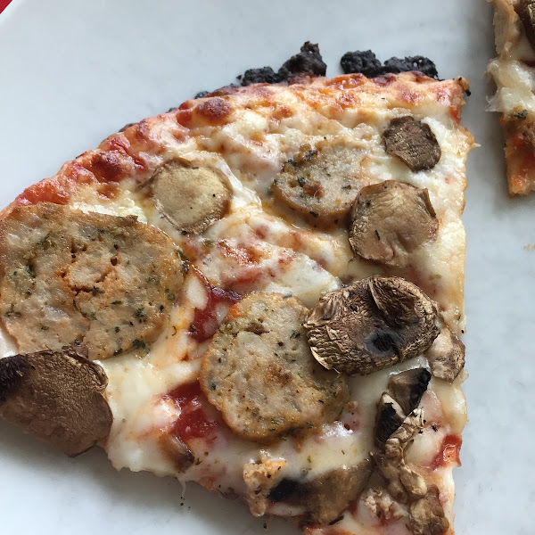 Cauliflower crust baked in a separate oven. I got sick but I’ll probably try it again 😅😩