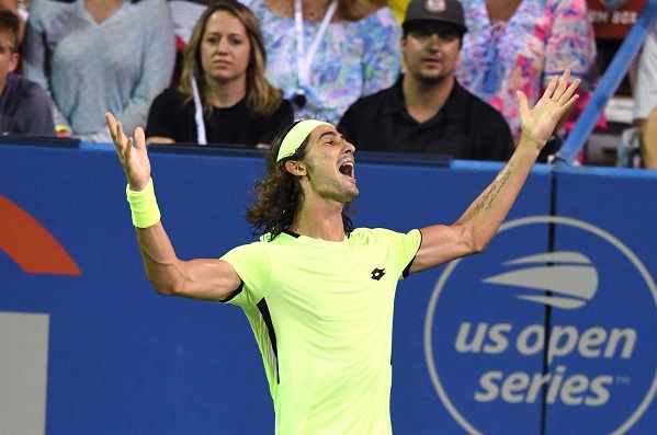 Lloyd Harris of South Africa celebrates his win over Rafael Nadal of Spain at the Citi Open at Rock Creek Tennis Centre in Washington DC on August 5 2021.