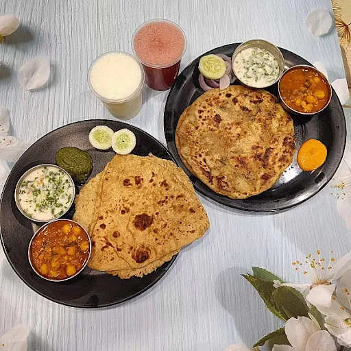 2 Wheat Paratha + 2 Aloo Paratha +2 Lassi