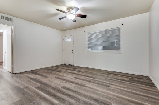 Living room with wood floor, door, window - Rent this luxury apartment / penthouse in Lancaster, 2 bedrooms
