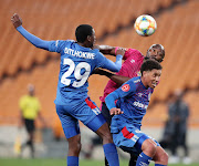 Luke Fleurs and Thatayaone Ditlhokwe of Supersport United challenged by Mwape Musonda of Black Leopards during their match last year.