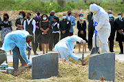 The  funeral of a Covid-19 victim at the Motherwell Cemetery in Port Elizabeth. Experts say   people living in poorer areas are  at heightened risk of dying   from Covid-19 due to several factors, including their  relatively high burden of disease.Picture: Theo Jeptha