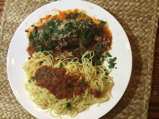 Amy’s Bracioli topped with tomato sauce and parsley with fresh angel hair pasta.