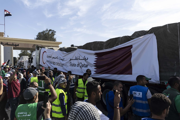 Aid convoy trucks cross the Rafah border in north Sinai, Egypt into Gaza on October 21 2023 in North Sinai, Egypt. Picture: MAHMOUD KHALED/GETTY IMAGES