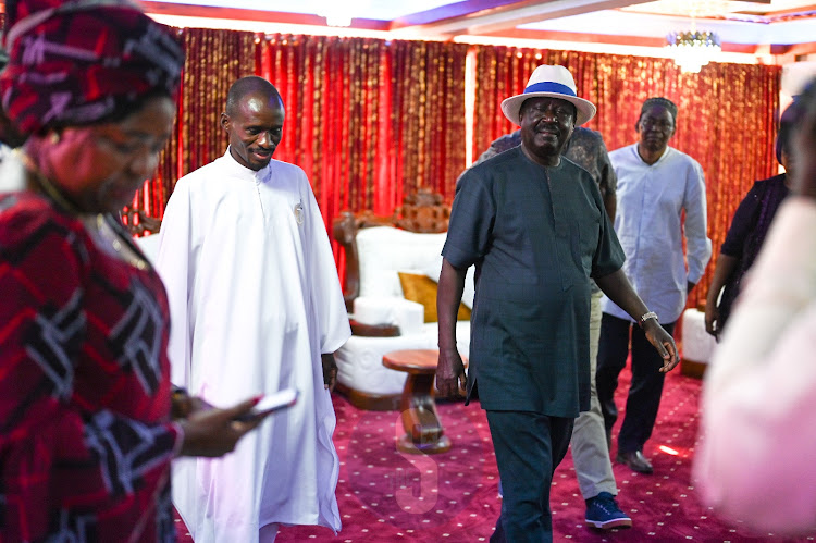 Azimio leader Raila Odinga with Pastor Ezekiel Odero inside the preacher's mansion in Kilifi County on Saturday, May 6, 2023.