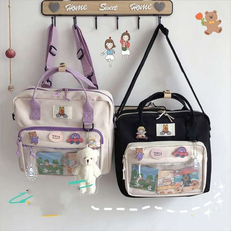 Japanse dual-use schooltas, schattige cartoon, grote capaciteit, draagbaar en crossbody, ideaal voor school en dagelijks gebruik.