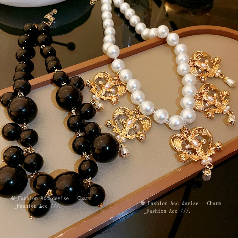 Parelhart kwastjesketting Franse stijl Hoge profielmode Temperament sleutelbeenketting Minderheid All-match mode-sieraad