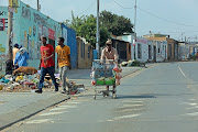 A man sells vegetables on the streets of Diepsloot during the national lockdown.