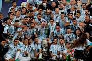 Lionel Messi and the Argentina squad celebrare after they beat Brazil to win the 2021 Copa America.  