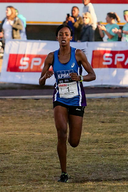 Defending champion Kesa Molotsane crosses the line to win her second straight title in the Port Elizabeth leg of the SPAR Women’s 10km Challenge at Pollok Beach on Saturday