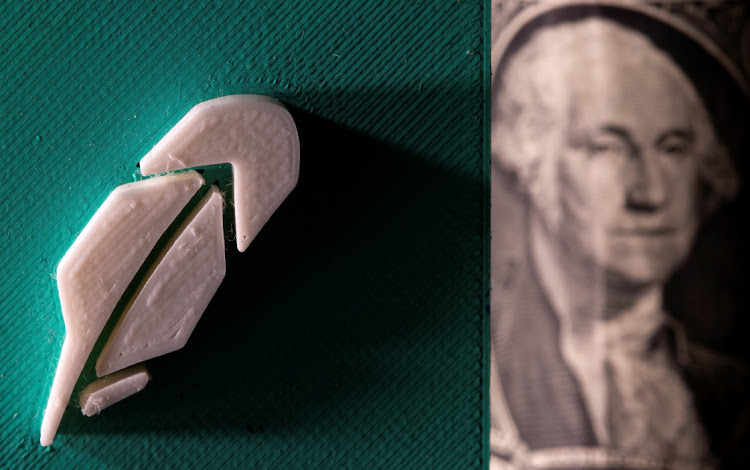 Robinhood's logo is seen in front of US dollar banknote in this illustration. Picture: REUTERS/DADO RUVIC