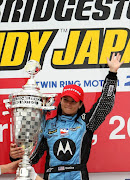 Danica Patrick driver of the #7 Motorola Andretti Green Racing Honda Dallara poses with the trophy after winning the IndyCar Series Bridgestone Indy Japan 300 Mile on April 20, 2008 at Twin Ring Motegi in Motegi, Japan