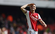 Arsenal's Granit Xhaka celebrates with the fans after scoring his first Premier League since 2020.