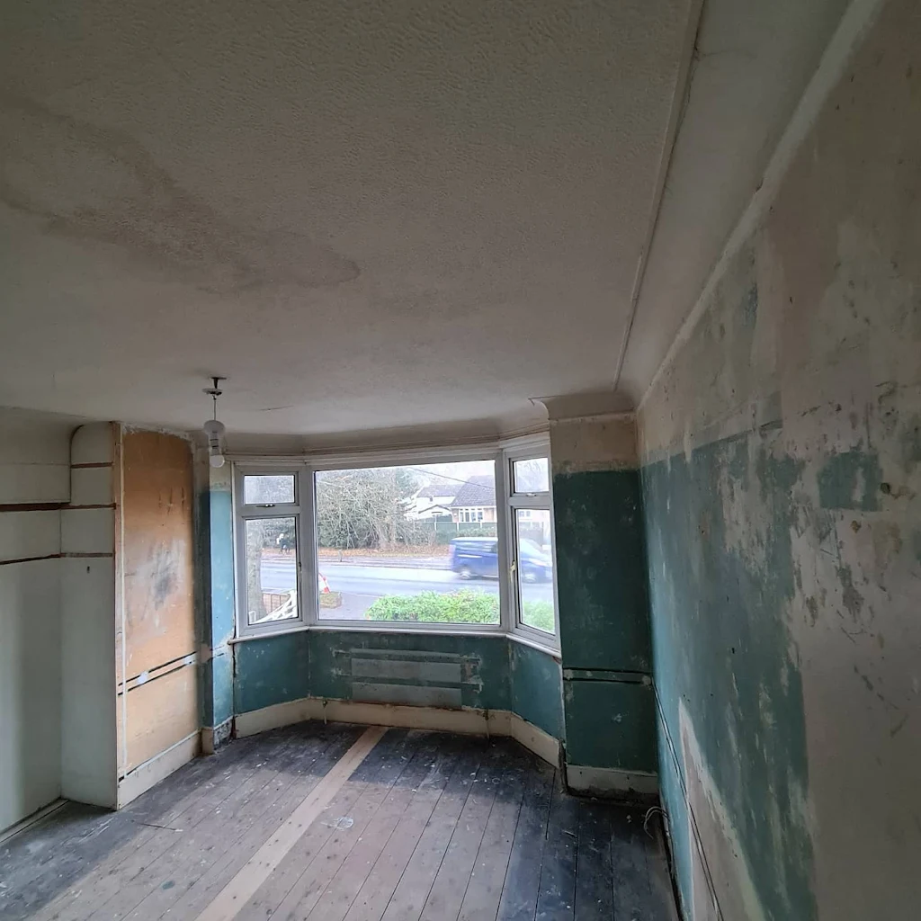 Remove hand turned corners, overboard ceiling, strip walls to brick, skim entire room  