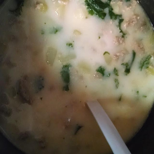 I took a photo of the soup in the stockpot with the ladle in it!  Not the best picture but this gives you an idea of what the soup will look like when done.  :-)