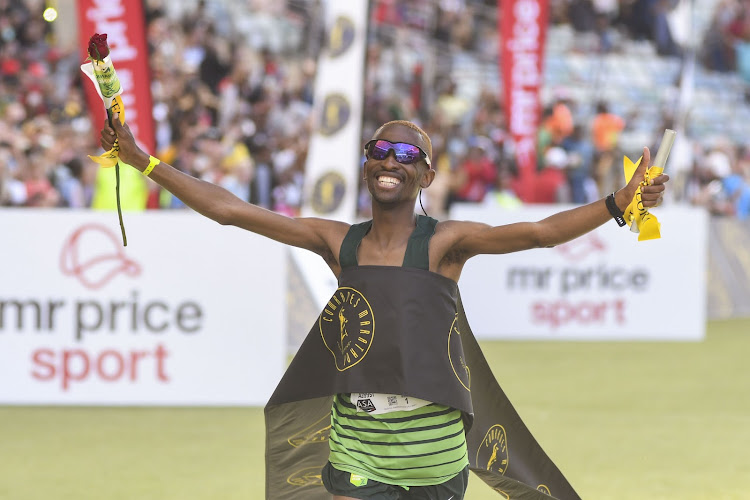 Tete Dijana wins the Comrades Marathon men’s race at the Moses Mabhida Stadium on Sunday in Durban. Picture: DARREN STEWART/GALLO IMAGES