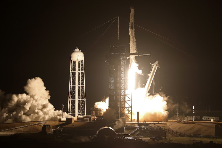 A SpaceX Falcon 9 rocket, with the Crew Dragon capsule, is launched carrying three NASA and one ESA astronauts on a mission to the International Space Station at the Kennedy Space Center in Cape Canaveral, Florida, US November 10, 2021.