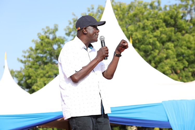 Devolution CAS Gideon Mung'aro addressing mourners during the burrial of lawyer George Kithi's father at Bale area in ganze Kilifi county.